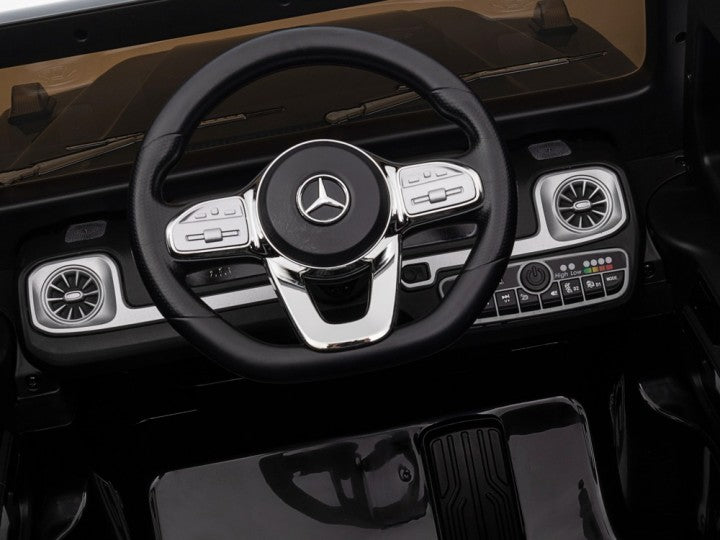 Mercedes-Benz G500 12V schwarz, Musik, Beleuchtung, Leder Sitze, Gummi Reifen