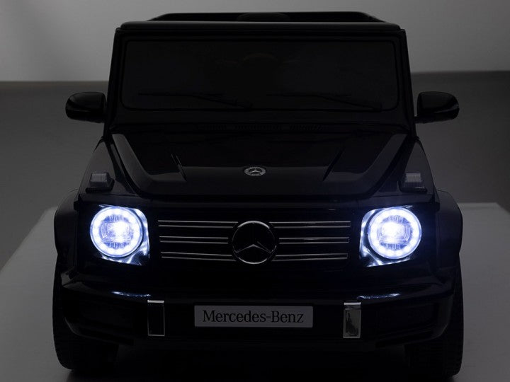 Mercedes-Benz G500 12V schwarz, Musik, Beleuchtung, Leder Sitze, Gummi Reifen